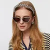 SILVER GRADUATED BEAD HEADBAND sold by Lele Sadoughi