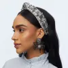 CHARCOAL STITCH CRYSTAL SNOWFLAKE SLIM KNOTTED HEADBAND sold by Lele Sadoughi