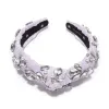 ORCHID SLIM KNOTTED CRYSTAL CLUSTER HEADBAND sold by Lele Sadoughi
