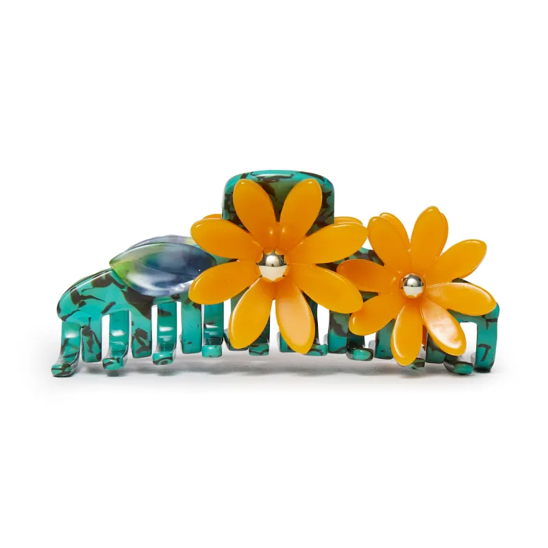 NEON TURQUOISE PETUNIA CLAW CLIP sold by Lele Sadoughi