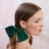 MAY EMERALD PALOMA JEWELED BIRTHSTONE BOW sold by Lele Sadoughi