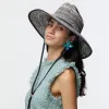 NAVY STRAW WOVEN HAT sold by Lele Sadoughi