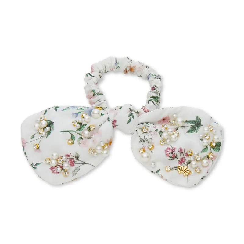 ANNIE PENNY LIBERTY PEARL CRYSTAL BOW SCRUNCHIE sold by Lele Sadoughi