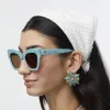 AZURE ASTRA BUTTON EARRINGS sold by Lele Sadoughi