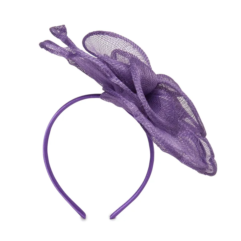PURPLE FLOWER PETAL FASCINATOR sold by Lele Sadoughi