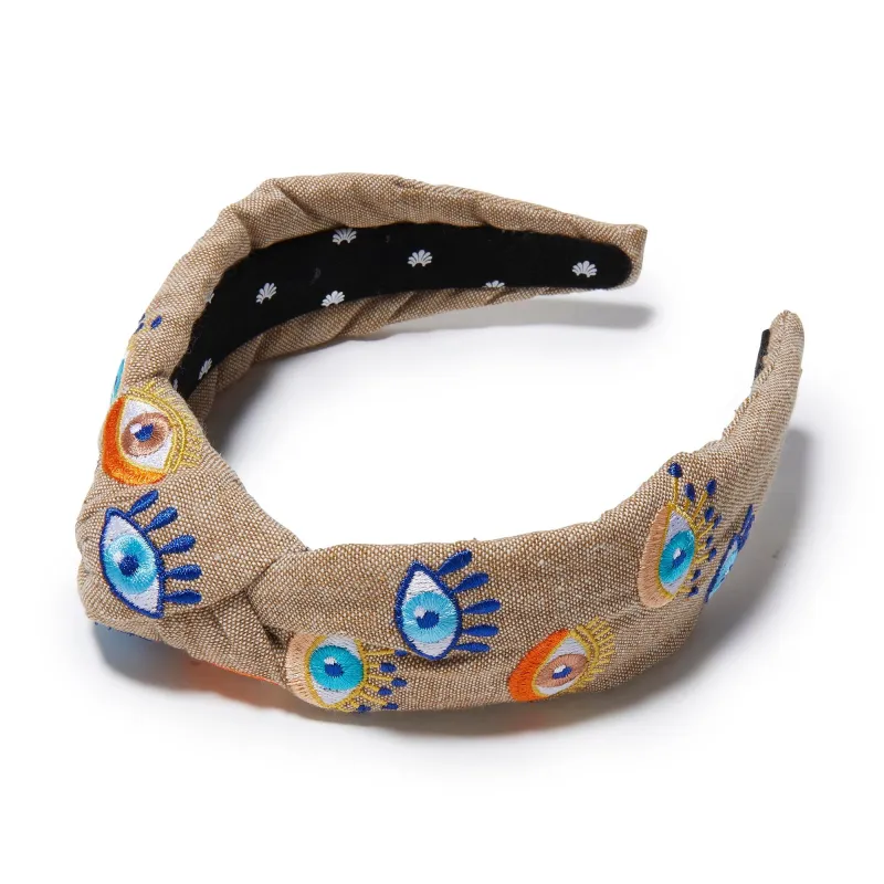 FAWN KNOTTED EVIL EYE EMBROIDERED HEADBAND sold by Lele Sadoughi