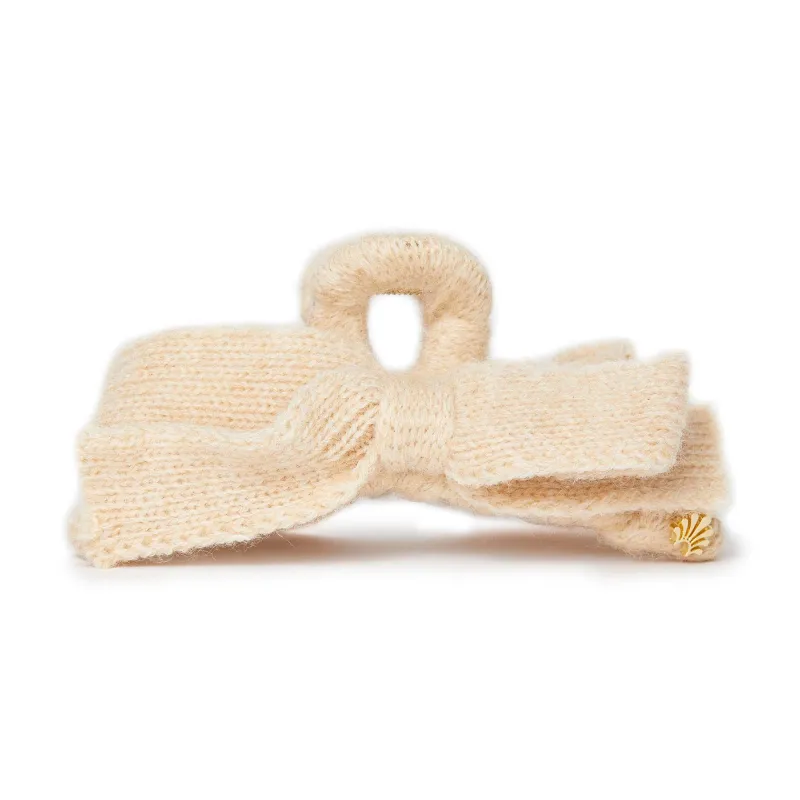 IVORY CABLE KNIT BOW CLAW CLIP sold by Lele Sadoughi