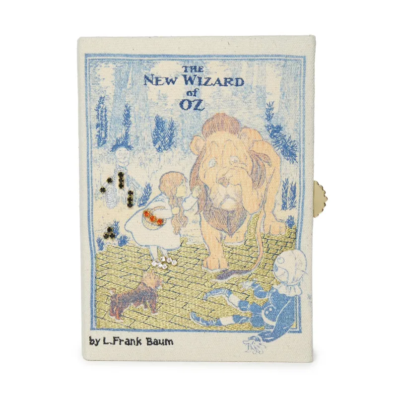 YELLOW BRICK THE NEW WIZARD OF OZ BOOK CLUTCH made by Lele Sadoughi