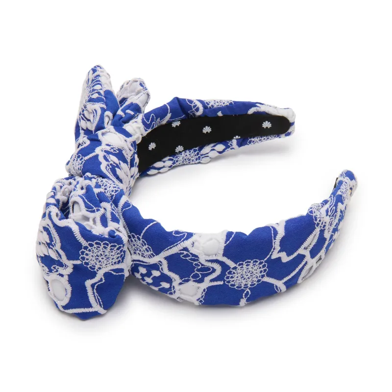 INDIGO HOLLY FLORAL EYELET HEADBAND sold by Lele Sadoughi