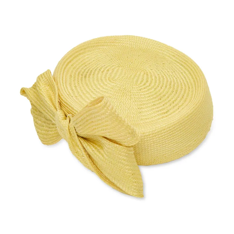 SUNSHINE BOW STRAW PILLBOX made by Lele Sadoughi