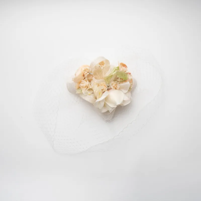 GOLDEN IVORY FLORAL BOUQUET VEIL FASCINATOR made by Lele Sadoughi