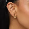 GOLD RUFFLED LILY STUD EARRINGS sold by Lele Sadoughi