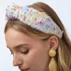 RAINBOW CONFETTI BOUCLE KNOTTED HEADBAND sold by Lele Sadoughi