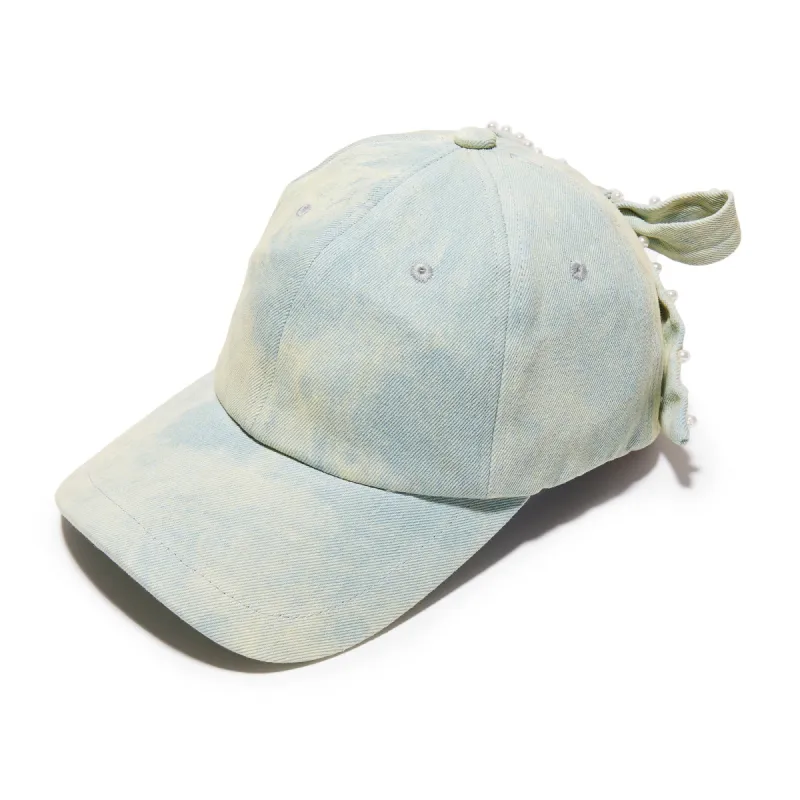 FADED DENIM BOW EMBELLISHED DENIM BASEBALL CAP sold by Lele Sadoughi
