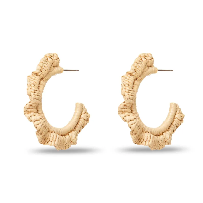 NATURAL RUFFLE RAFFIA HOOP EARRINGS sold by Lele Sadoughi