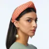 APRICOT RAFFIA KNOTTED HEADBAND sold by Lele Sadoughi