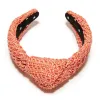APRICOT RAFFIA KNOTTED HEADBAND sold by Lele Sadoughi