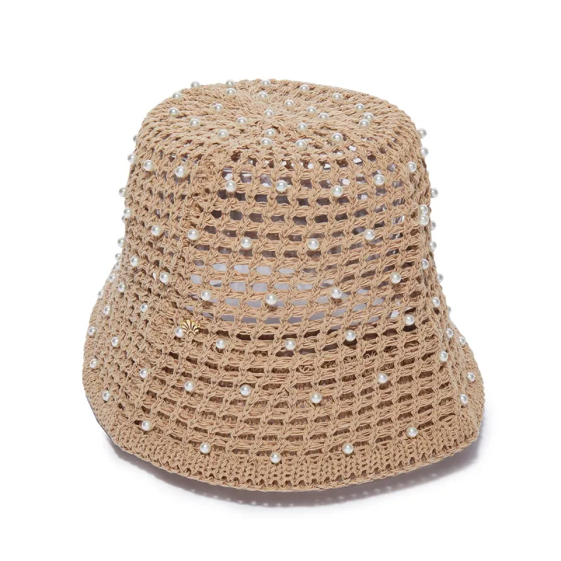 NATURAL OPEN WEAVE PEARL BUCKET HAT sold by Lele Sadoughi