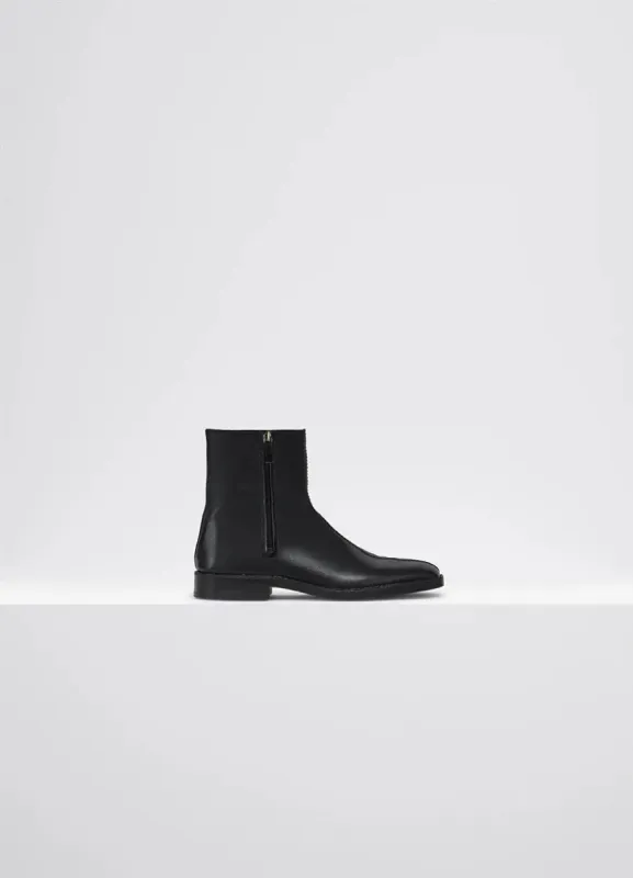 PIPED ZIPPED BOOTS made by Lemaire