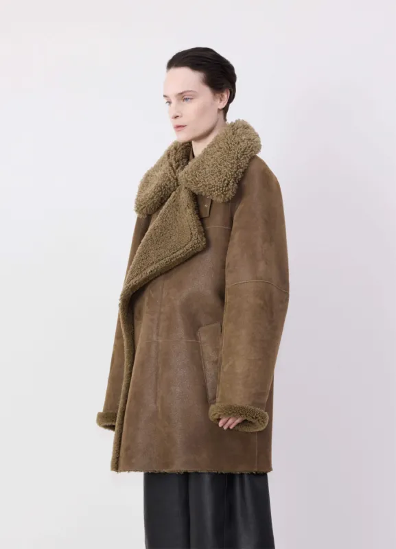 ASYMMETRICAL SHEARLING COAT IN LEATHER made by Lemaire
