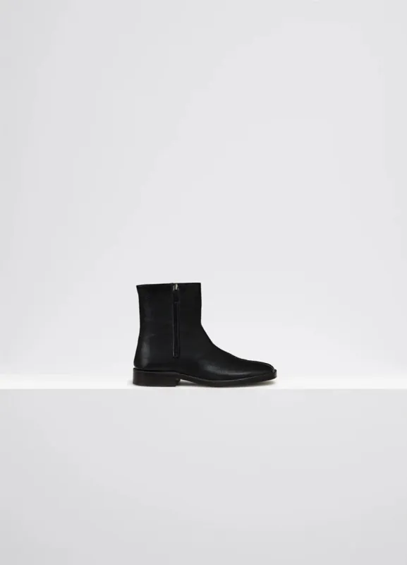 PIPED ZIPPED BOOTS made by Lemaire
