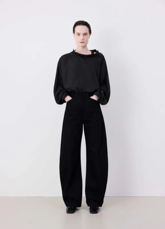 HIGH WAISTED CURVED PANTS sold by Lemaire