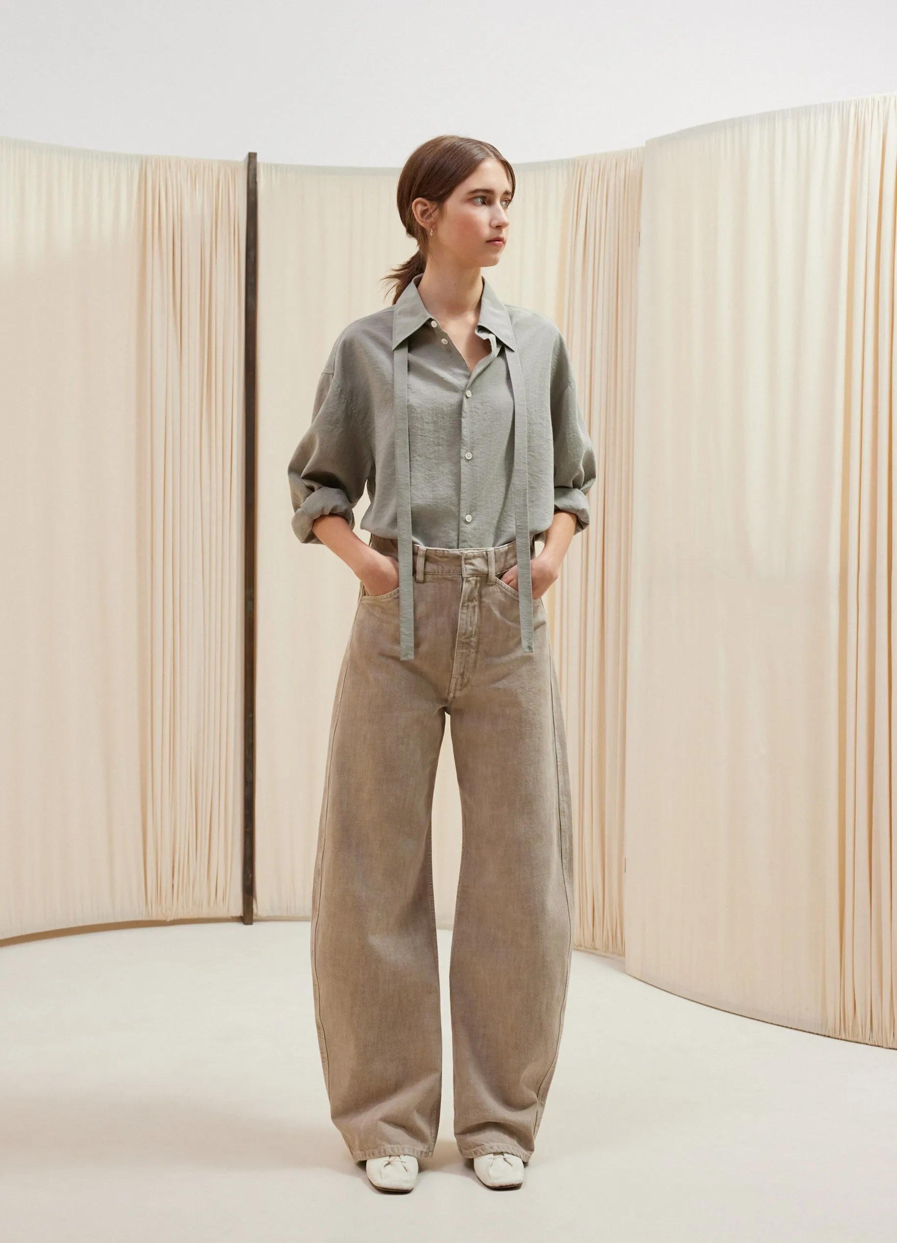 HIGH WAISTED CURVED PANTS sold by Lemaire