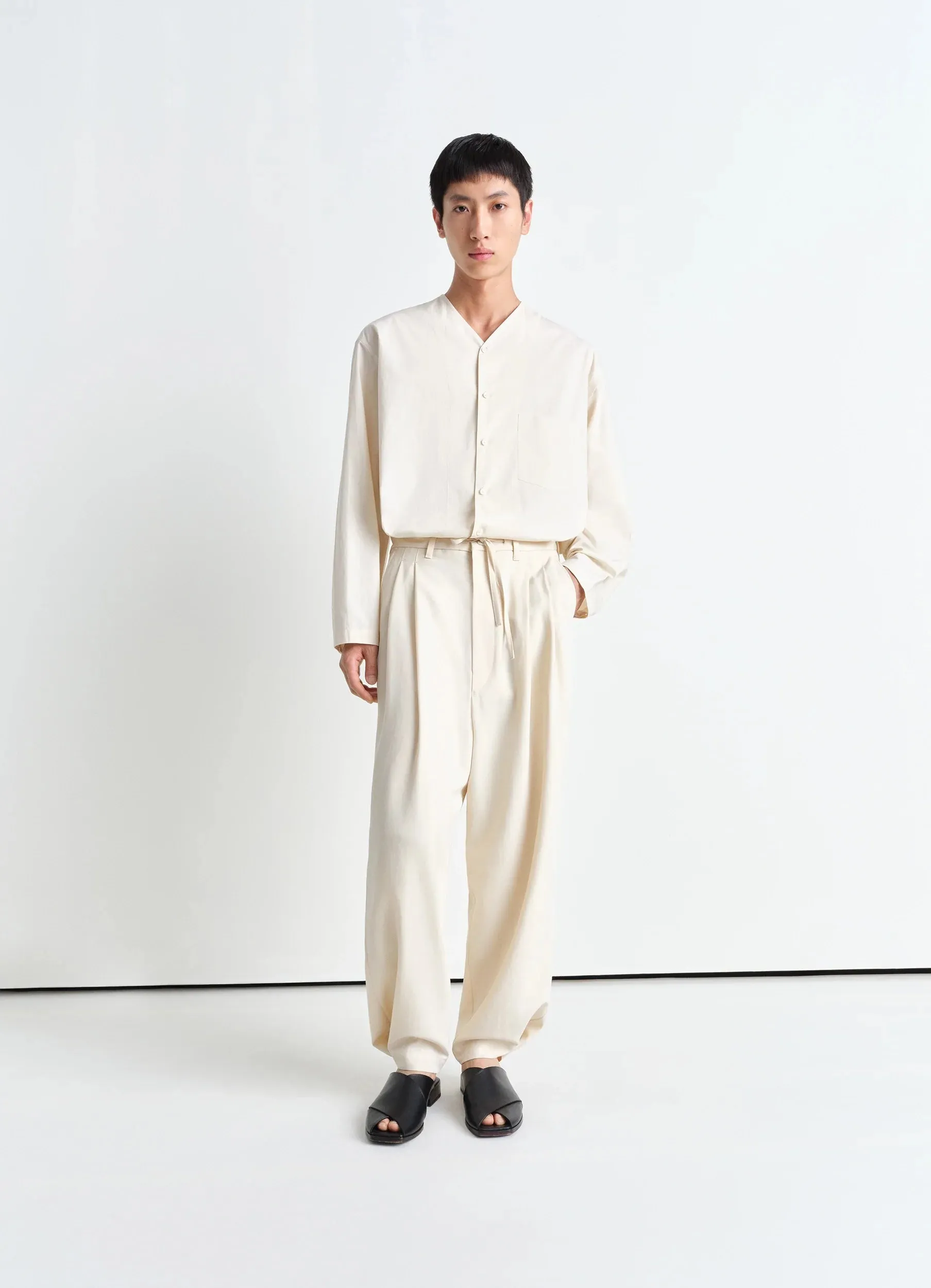 DRAWSTRING PLEATED PANTS sold by Lemaire