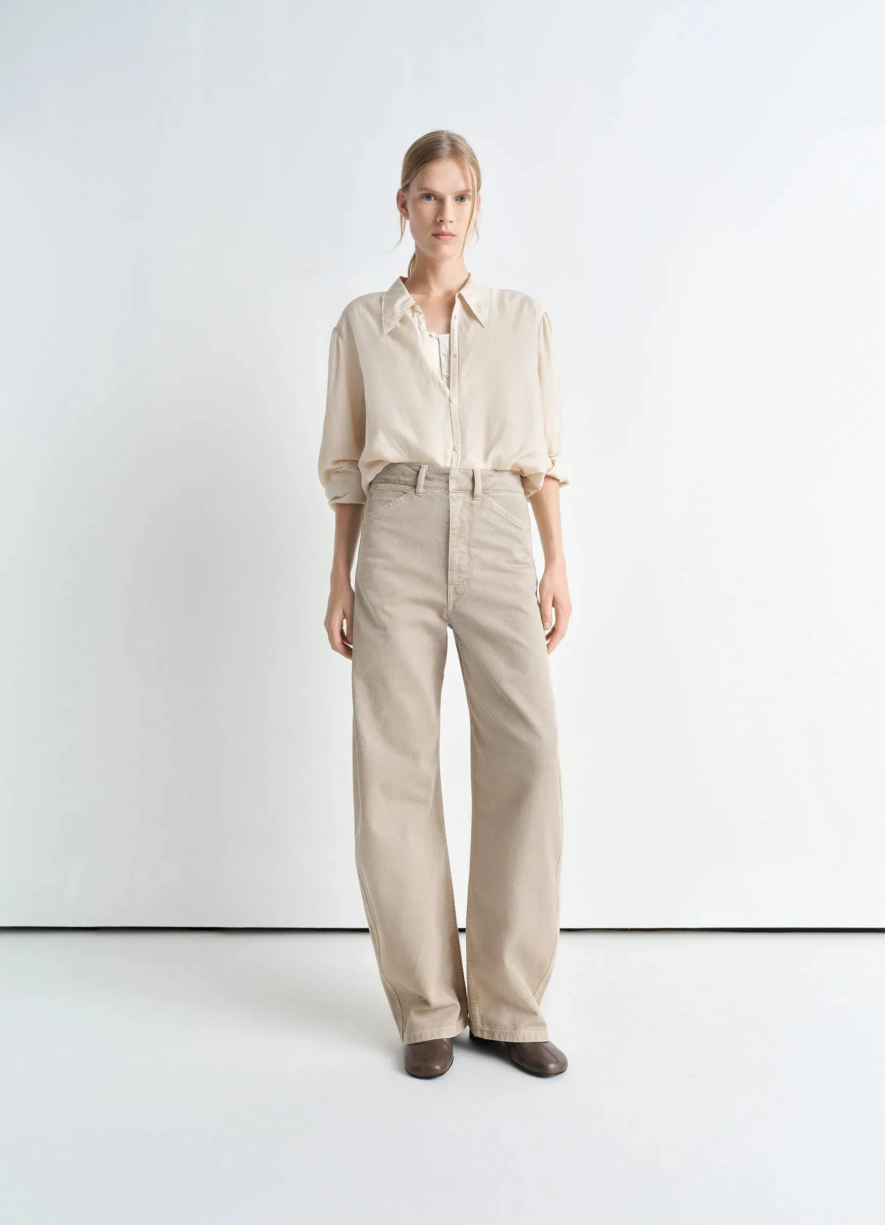 HIGH WAISTED CURVED PANTS sold by Lemaire