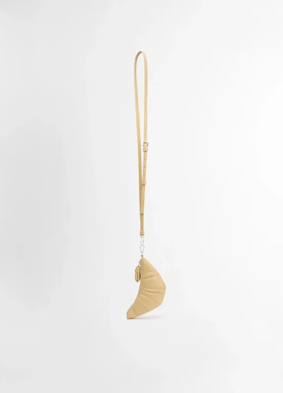 CROSSBODY CROISSANT COIN PURSE sold by Lemaire