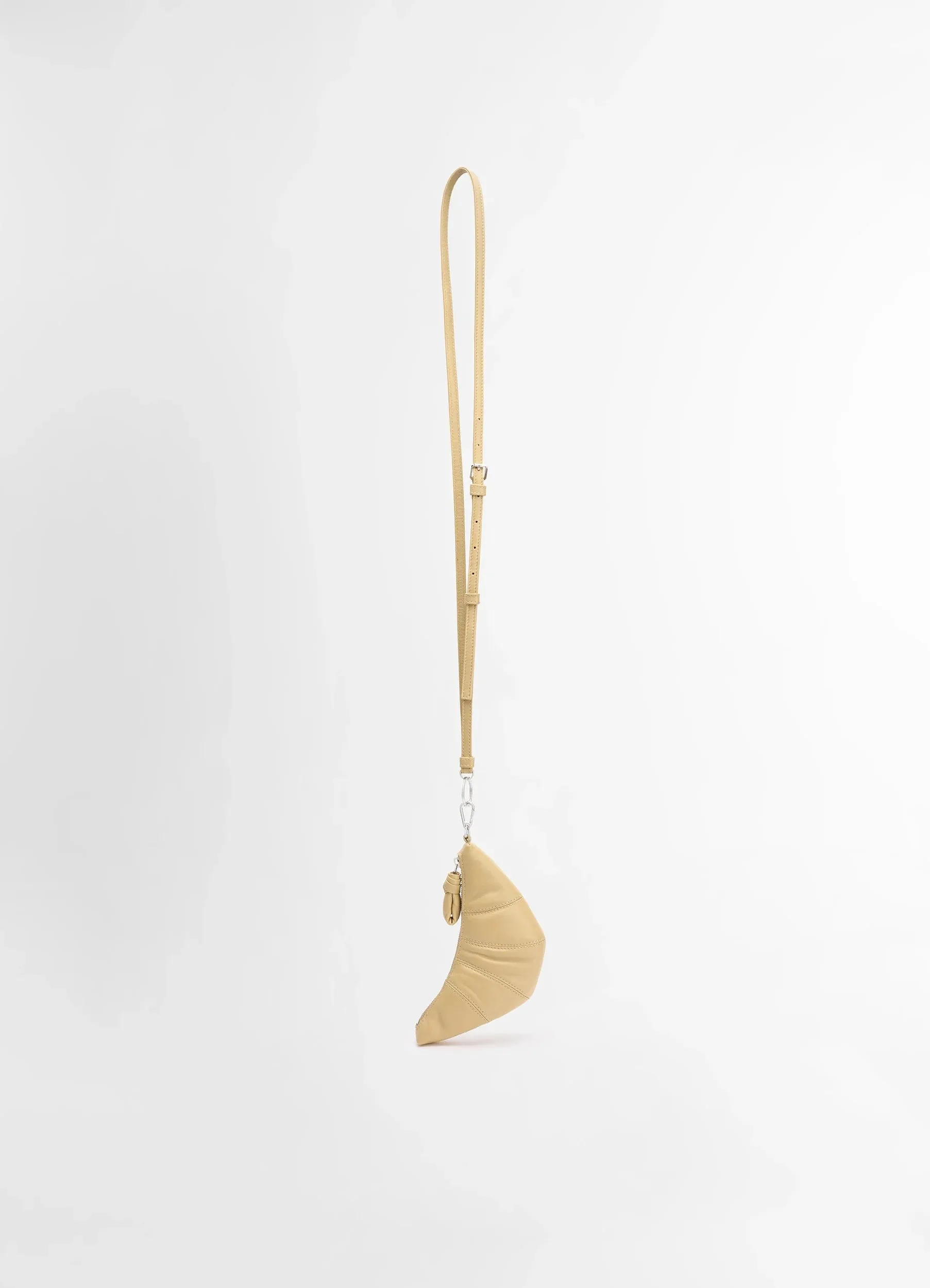 CROSSBODY CROISSANT COIN PURSE sold by Lemaire