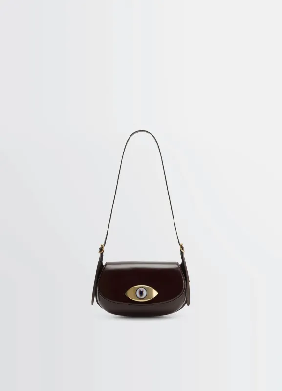 AUBOCK EYE BAG IN LEATHER made by Lemaire