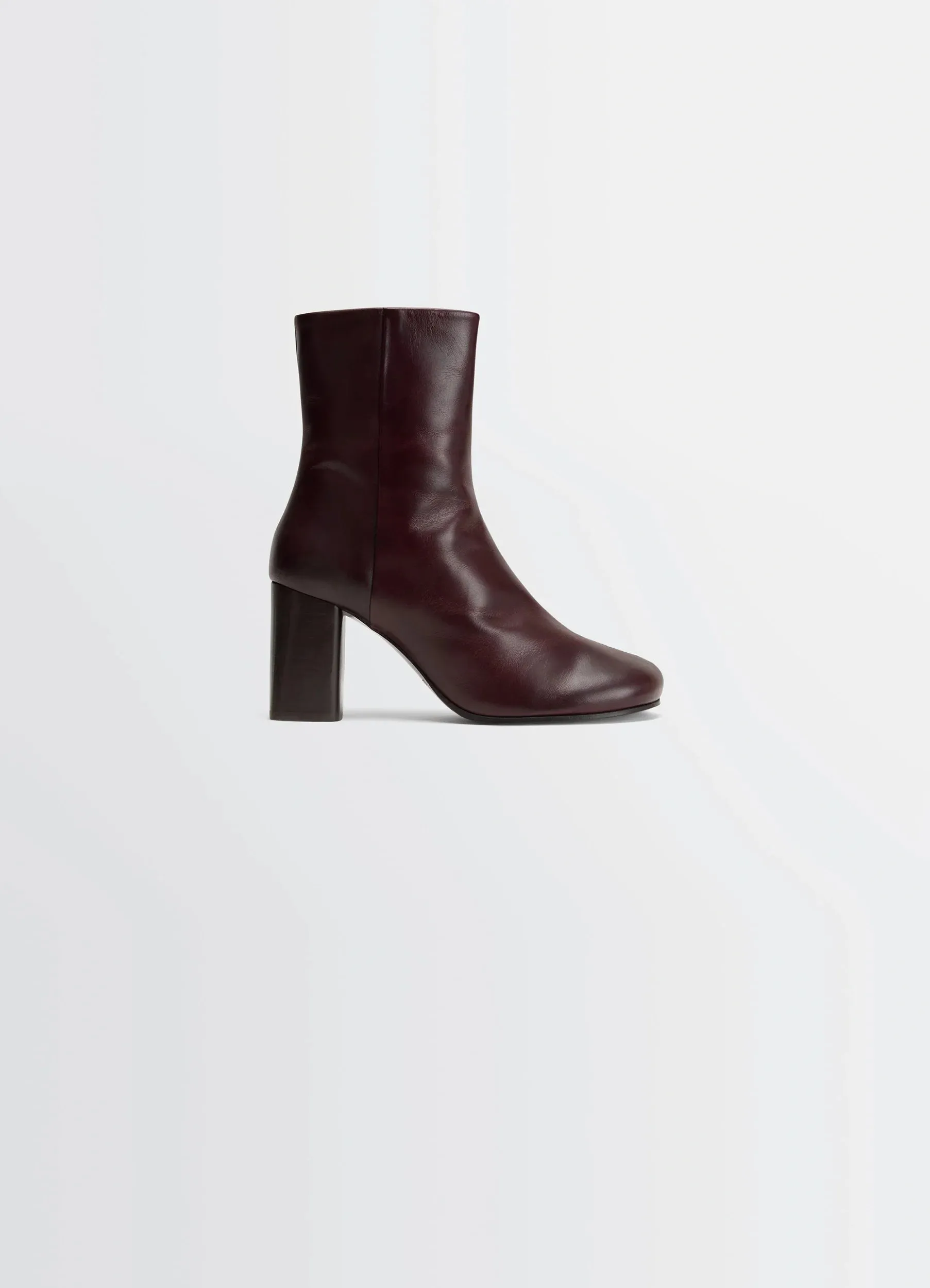 ANATOMIC BOOTS WITH 80MM HEEL IN GLOSSY VEGETABLE LEATHER sold by Lemaire