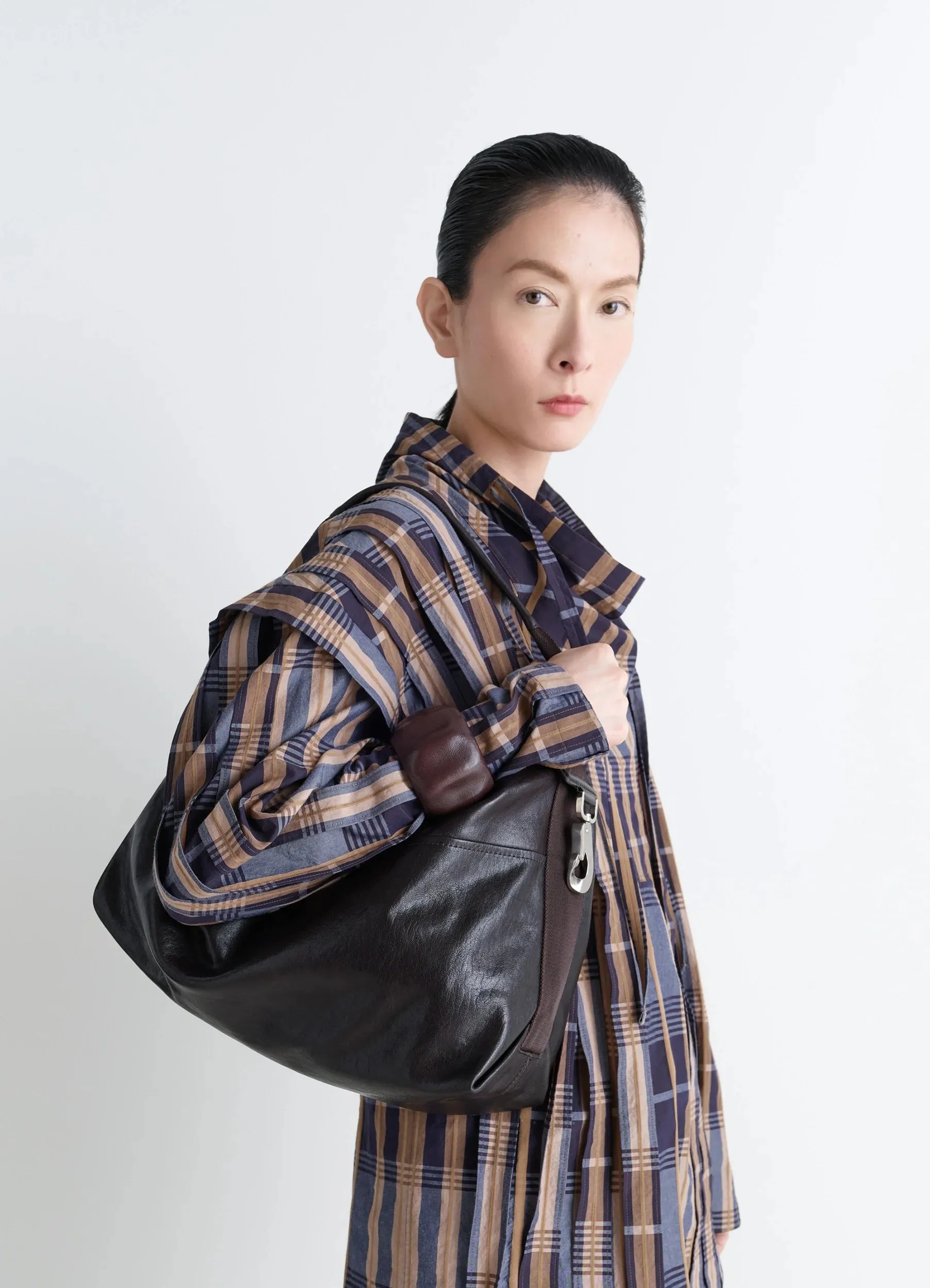 BERLINGOT HOBO BAG IN LEATHER sold by Lemaire