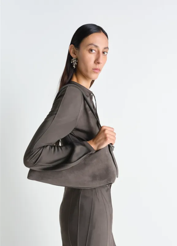 BELTED BAGUETTE BAG IN SUEDE LEATHER sold by Lemaire
