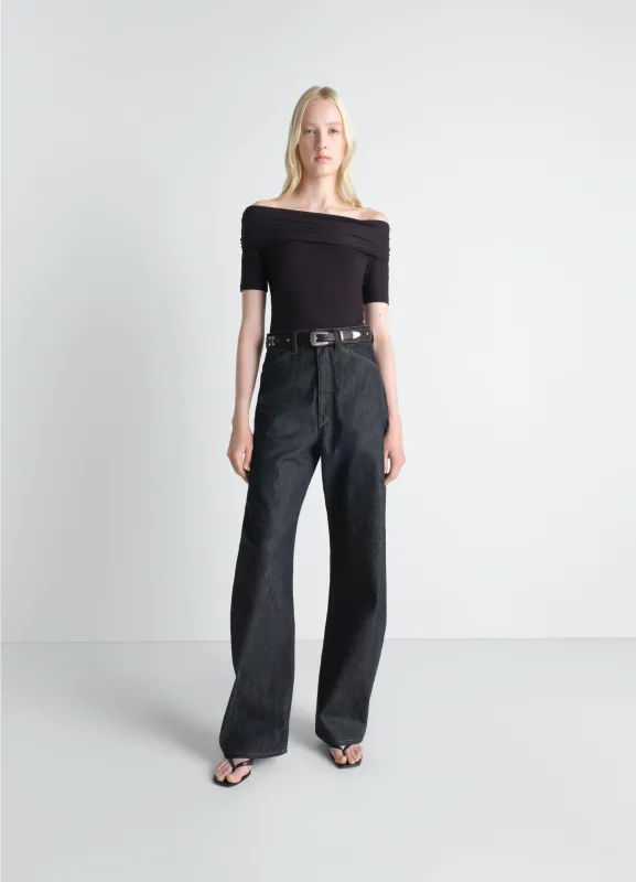 HIGH WAISTED CURVED PANTS IN DENIM made by Lemaire