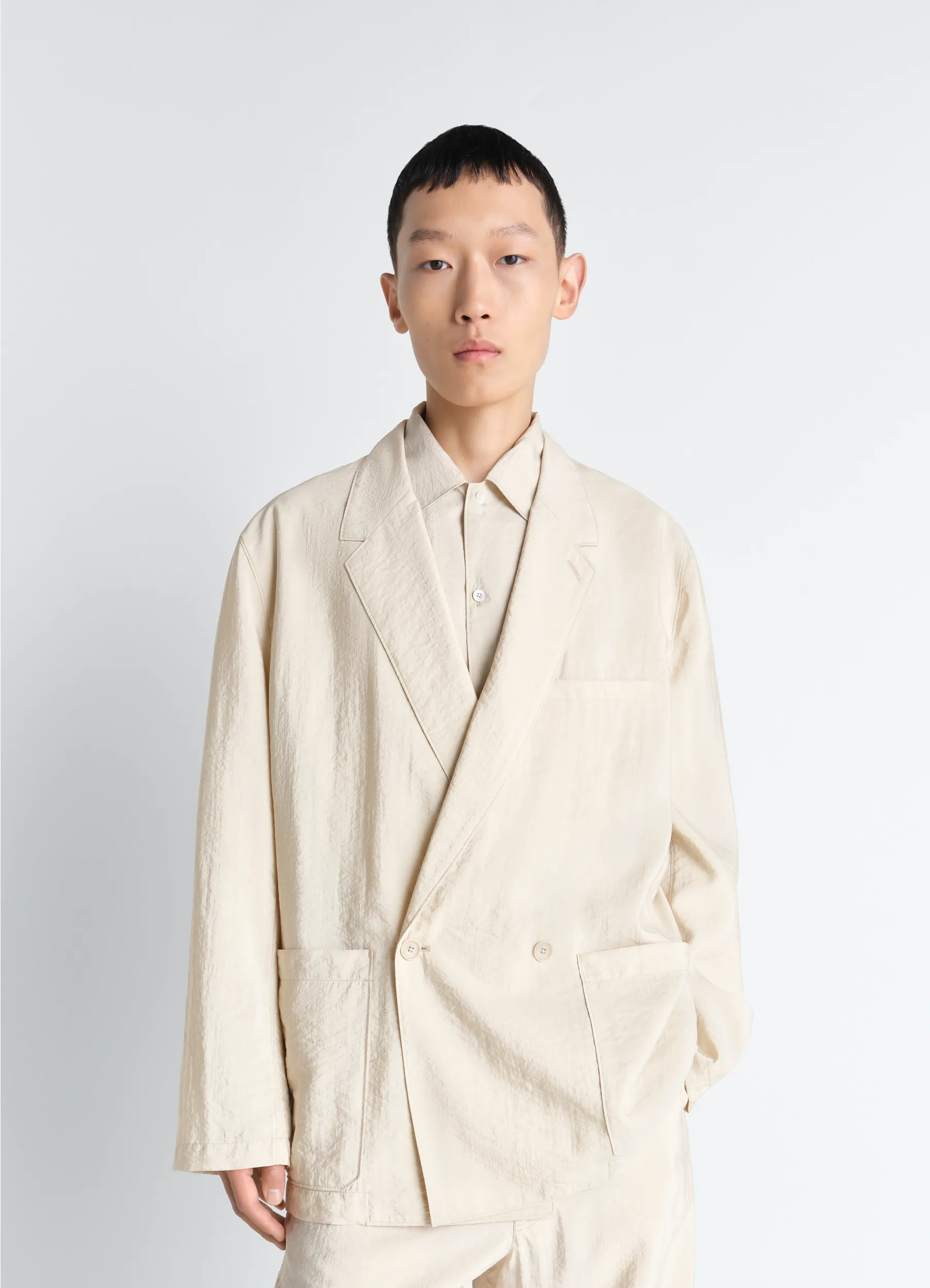 SOFT DOUBLE BREASTED JACKET IN DRY SILK sold by Lemaire