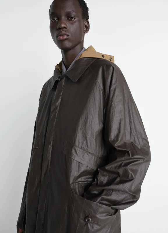 RAIN JACKET WITH DETACHABLE HOOD IN COATED TECHNICAL LINEN made by Lemaire