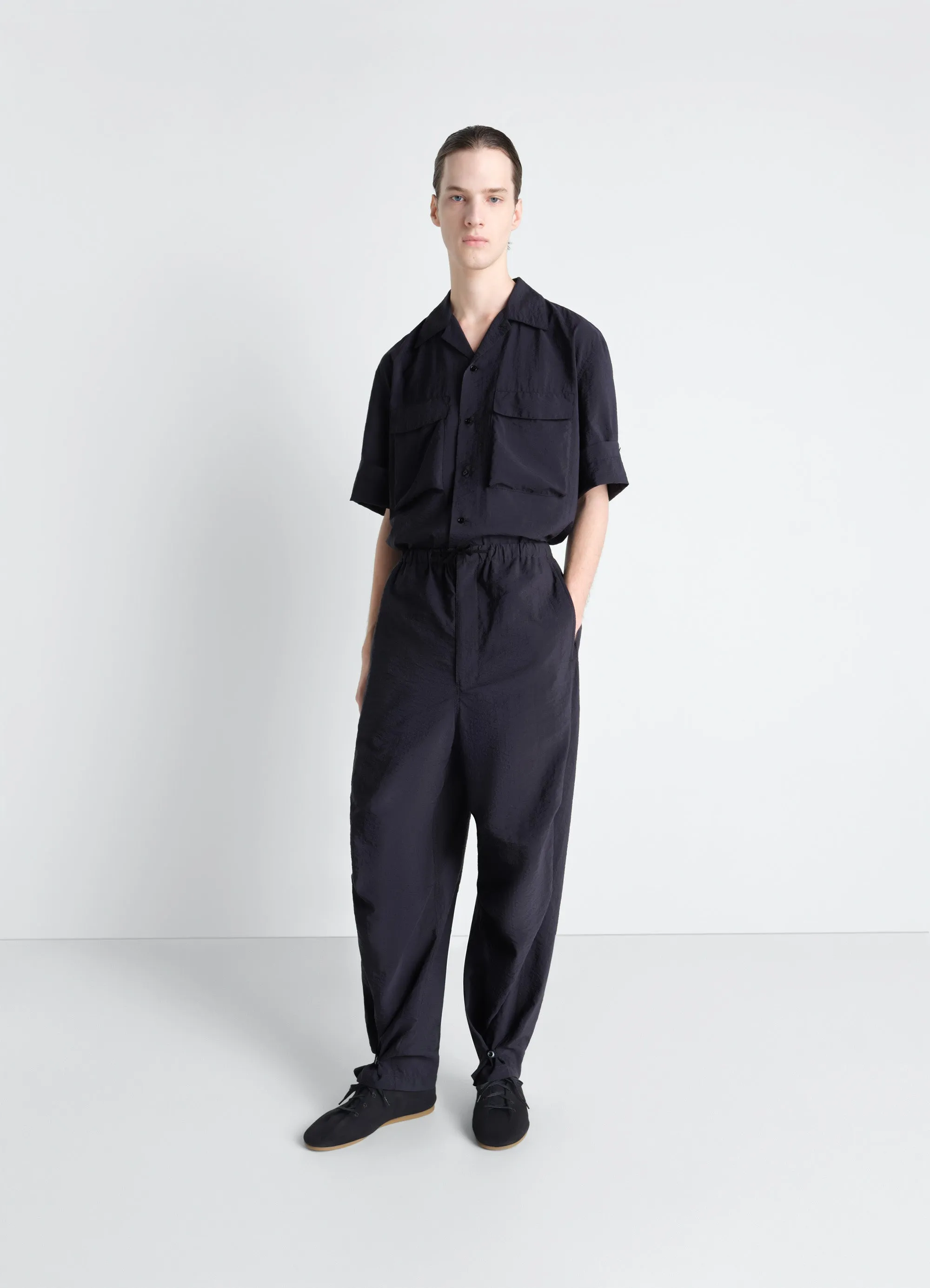 PARACHUTE PANTS IN WASHED TECHNICAL COTTON sold by Lemaire