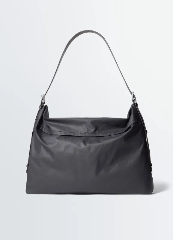 MEDIUM TRENCH POCKET BAG IN WATER-REPELLANT RESINATED COTTON made by Lemaire