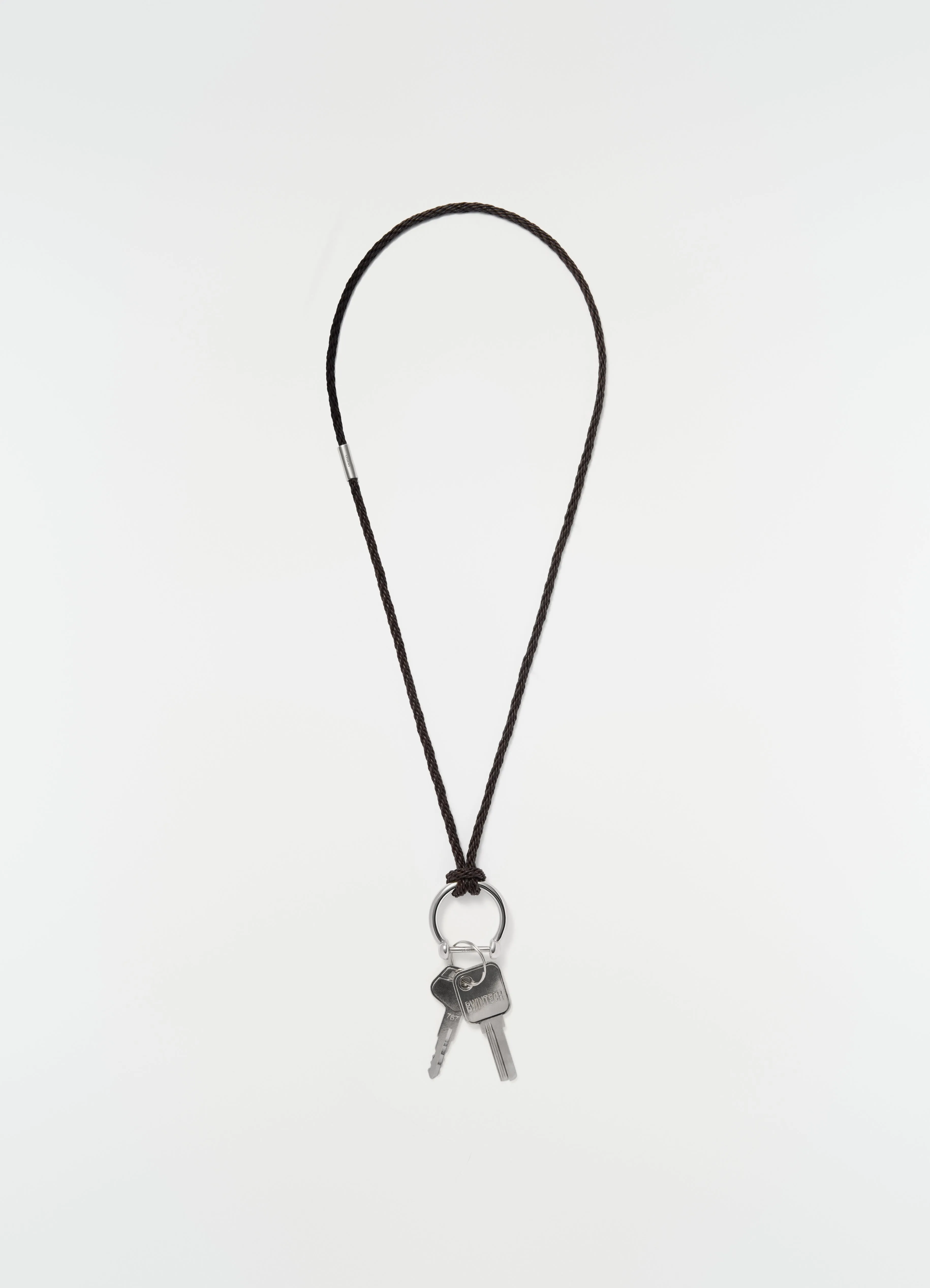 KEYRING NECKLACE WITH BRAIDED RECYCLED LEATHER CORD sold by Lemaire