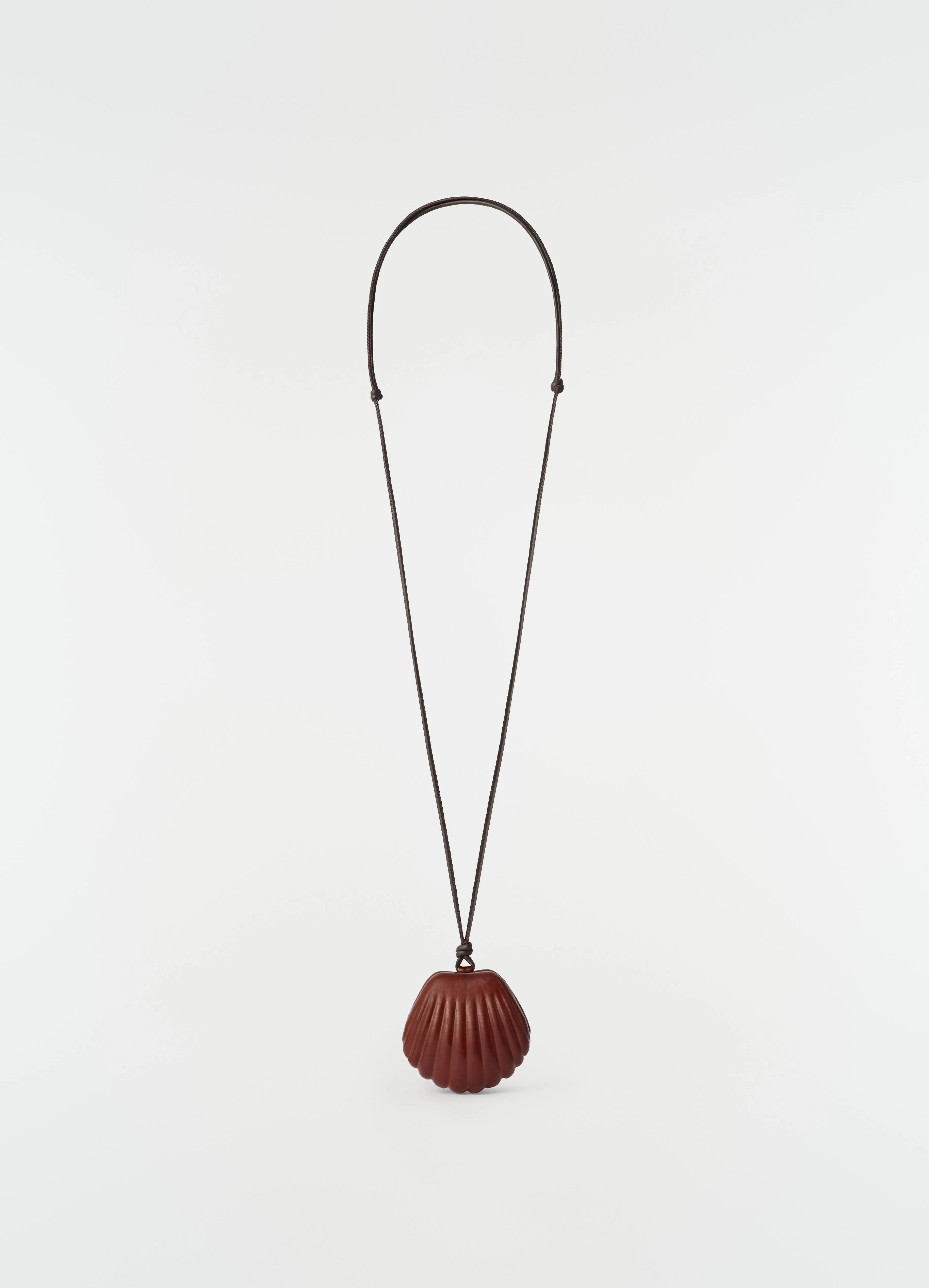 SHELL MIRROR IN PATINATED CALFSKIN sold by Lemaire