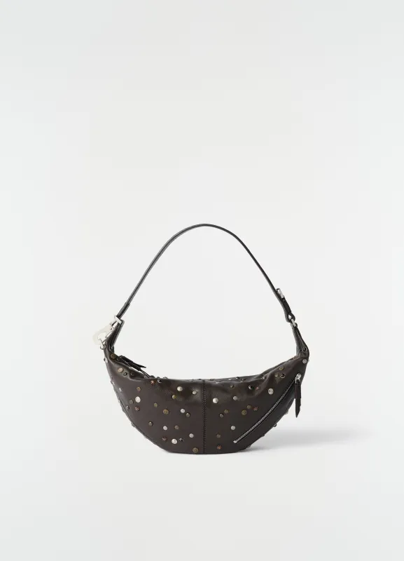 MINI QUIVER CLIP BAG IN SATELLITE-STUDDED GRAINED BUFFALO LEATHER made by Lemaire