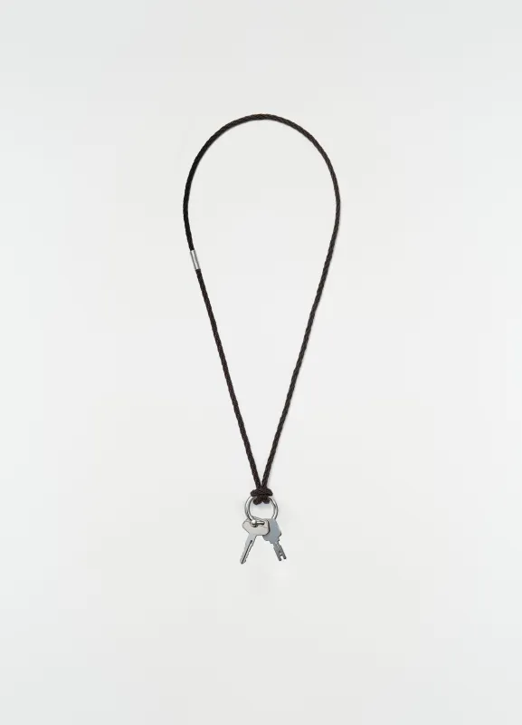 BRAIDED LEATHER KEYRING NECKLACE IN RECYCLED LEATHER CORD made by Lemaire