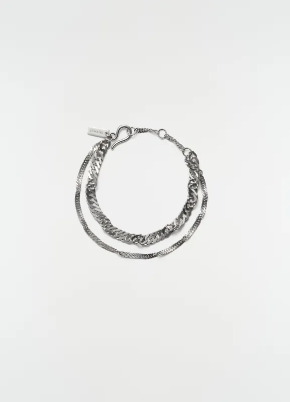 TWISTED CHAIN BRACELET IN RHODIUM SILVER made by Lemaire
