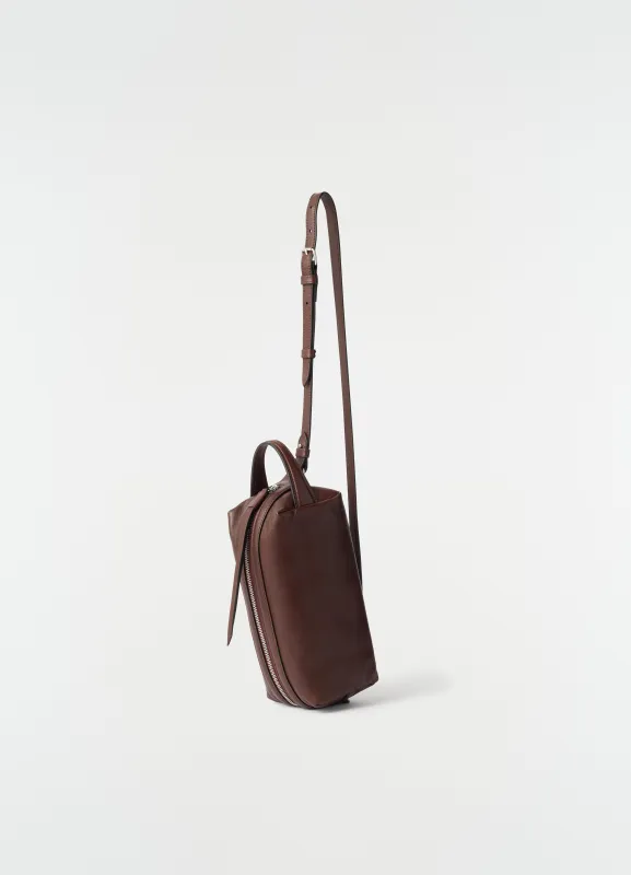SMALL CARE BAG IN SOFT NAPPA LAMBSKIN LEATHER made by Lemaire