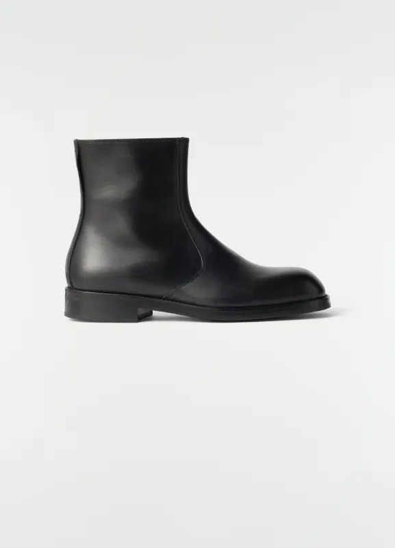 ZIPPED BOOTS IN SHINY VEGETABLE LEATHER made by Lemaire