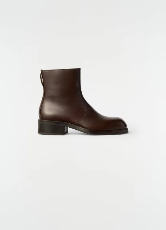 ZIPPED BOOTS IN SHINY VEGETABLE LEATHER made by Lemaire