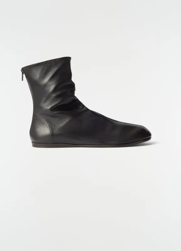 SOCK BOOTS IN SHINY NAPPA LAMB LEATHER made by Lemaire