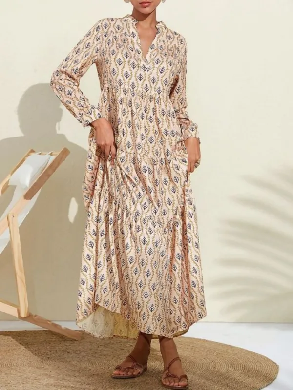 Printed Notched Long Sleeve Midi Dress sold by Leota